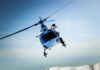 Gunman Shoots Helicopter – Town Locked Down helicopter banking over snowy mountains