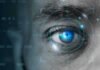 Extinction Alarm JOLTS AI Heavyweights Human eye with digital scanning interface