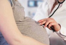 Campus Gasps As Candidate Reduces Mothers Pregnant woman examined with stethoscope