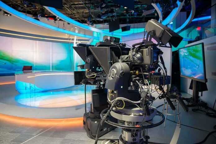 shutterstock_350391749 robotic television cameras on a modern news studio set