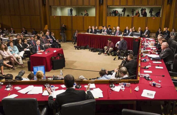 Patrick Leahy and Samuel Alito at a Senate hearing with committee and press present