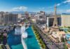 Las Vegas Strip skyline with fountains and Eiffel Tower replica