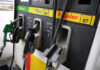 Gas station pumps for diesel, plus, and regular fuel.