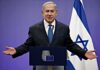 Risky Alliance: Israel Courts Europe’s Hard Right man in suit speaking at a podium with Israeli flag