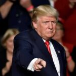 Polls Hand Trump a Green Light Donald Trump points toward the audience at an event