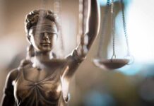 Lady Justice statue holding scales