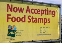 Feds Nab Governor’s Aide Over Food Cash Yellow banner announcing acceptance of food stamps and EBT