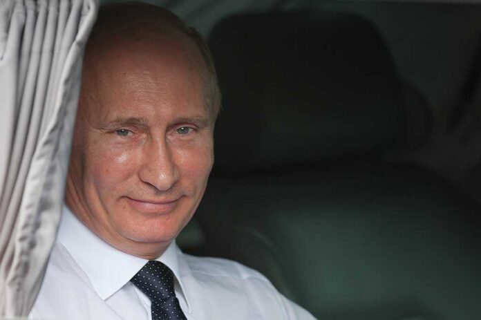 Vladimir Putin smiling in a car window