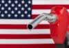 War Costs Jolt Republican Unity gas pump nozzle with droplet against American flag background