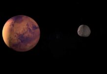 A depiction of Mars and its moon in outer space