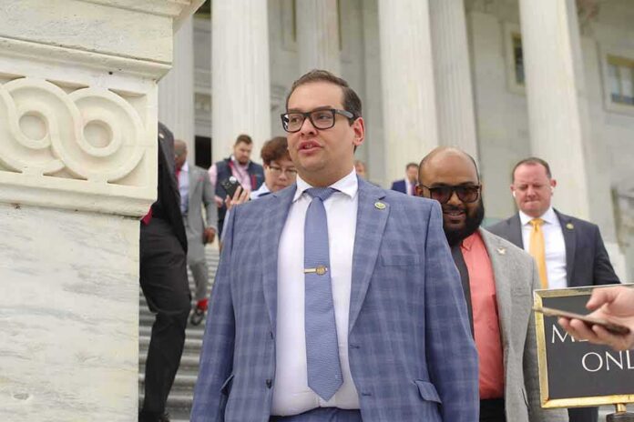 man in a blue plaid suit walking down marble steps