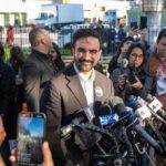 Mourning Day Hijacked – NYC Erupts Zohran Mamdani speaks at a press conference; Julia Bacha is visible among the crowd