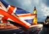 UK Shock: Plot Against Farage Exposed Union Jack flag waving with clock tower in London at dusk