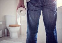 Antibiotics Whiff – Shigella Goes Wild Person holding a toilet paper roll in a bathroom